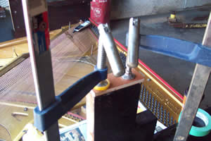 Gluing  on new  Veneer.